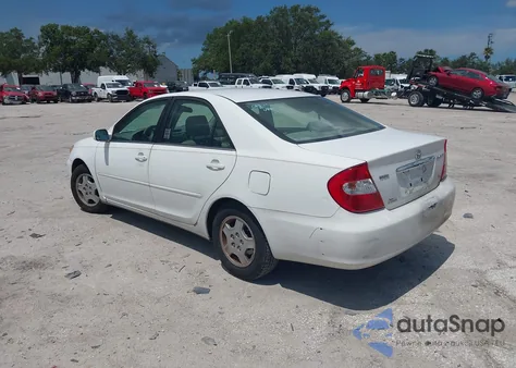 2003 Toyota Camry Le V6 z USA, uszkodzony, nr VIN 4T1BF32K03U054852